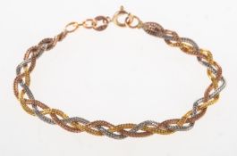 A 9ct gold tri-colour bracelet, of plait design, UK import mark, length approx. 15.0cm, 3.0grams.