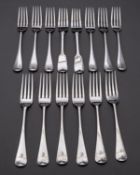 A mixed group of silver dessert forks including;