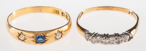 An 18ct gold sapphire and diamond ring and one other ring,