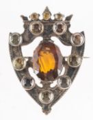 A Victorian Scottish Luckenbooth brooch, an openwork heart shaped brooch with surmounting crown,