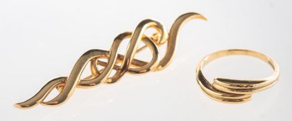 A brooch and a ring, the brooch of twist design, partial UK import mark for 375, length approx. 5.