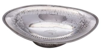 An Edward VI silver oval breadbasket by George Unite & Sons, Birmingham 1904, of oval form,