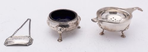 A George V silver tea strainer and stand by Adie Brothers Ltd, Birmingham 1926,