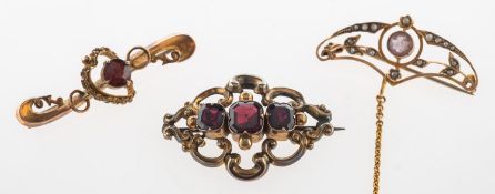 A group of three antique brooches,