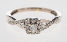 A 9ct gold diamond cluster ring,