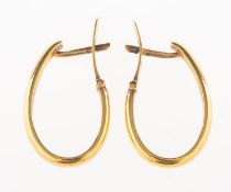 A pair of 'huggie' earrings, of plain design, post and clip fitting, Foreign marks to clips,