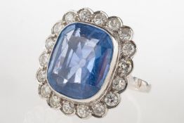A fine and impressive sapphire and diamond cluster ring,