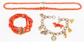 A mixed group of jewellery, including a fancy-link bracelet with eight attached charms,