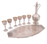 A mid 20th century Persian export silver plated liqueur set, unmarked, comprising an oval tray,
