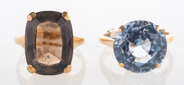 Two gem-set cocktail rings, a 9ct gold ring set with an oval mixed-cut smokey quartz, UK hallmarks,