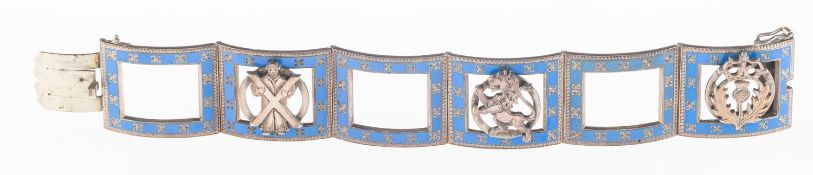 A Scottish enamelled bracelet, of six openwork square panels, each with blue enamel decoration,