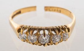 An antique five stone diamond ring, claw set with five graduated old-cut diamonds, diamonds approx.