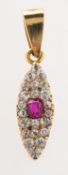 A ruby and diamond pendant, of navette form, grain set with a small cushion-cut ruby,