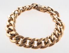 A curb link bracelet, with push-in clasp and two figure of eight safety catches,