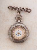 An ornate silver pocket watch with decorative white and pink enamelled dial,