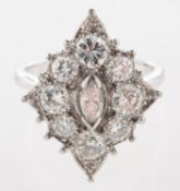 A diamond cluster ring, of navette form and set to the centre with a marquise-cut diamond,