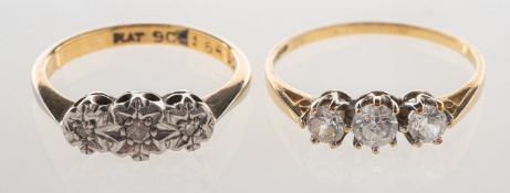Two three stone rings,