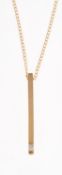 A 9ct gold diamond bar pendant with chain,