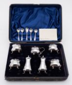 A Victorian cased seven piece silver cruet set by John Round & Son Ltd, Sheffield 1896,