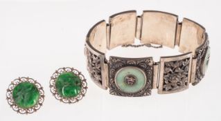 A pair of jade earrings and a jade set bracelet, a pair of stud earrings,
