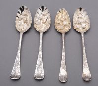 A pair of George II silver Hanoverian pattern berry spoons by Grundy Roode, London 1737,