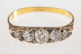 A Victorian five stone diamond ring, set with five graduated old-cut diamonds,