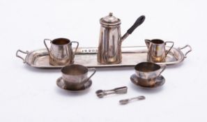 An Edward VII silver miniature doll's house coffee service and tray by Levi & Salaman,