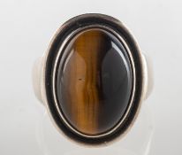 Georg Jensen. A silver tiger's eye ring, number 46A, set with an oval tiger's eye cabochon