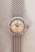 Omega Ladymatic a white gold and diamond lady's wristwatch the dial having baton numerals,