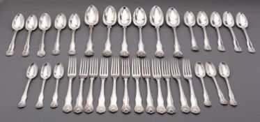 A matched canteen of Victorian flatware King's Husk pattern cutlery, various makers and dates,