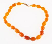 A string of 'amber type' beads,