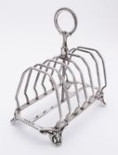 A Victorian seven bar silver toast rack possibly by John Gilbert, Birmingham 1865,