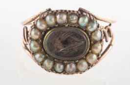 A Georgian pearl and hairwork mourning ring,