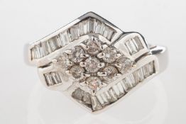 A diamond set ring, a ring set with a mixture of baguette-cut diamonds and brilliant-cut diamonds,