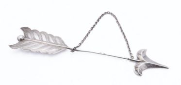 An early 20th century Danish silver cloak or hat pin in the form of an arrow by M.E.