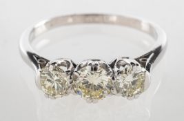 A three stone diamond ring, claw set with three brilliant-cut diamonds, diamonds approx. 1.