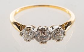 A three stone diamond ring, set with three old-cut diamonds, diamonds approx. 0.