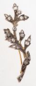 A Victorian diamond brooch, of foliate form and set with a mixture of small old-cut diamonds,