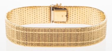 A polished and textured bracelet, a flexible wide bracelet with a polished and textured pattern,