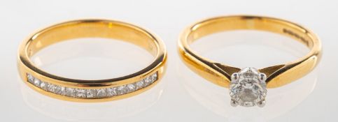 Two 18ct gold diamond set rings,