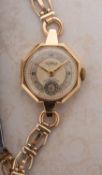 Roamer, a 9ct gold wristwatch the round two-tone gold dial having Arabic numerals, dauphine hands,