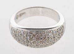 An 18ct white gold diamond bombé ring,