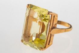 A 9ct gold cocktail ring, claw set with a rectangular-cut green quartz, approx. 40.