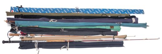 A mixed collection of fly fishing rods.