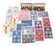 Two 1953 coins sets , together with two Liberation of the Falkland Island sets,