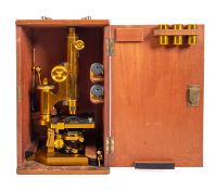 An Edwardian lacquered brass binocular microscope , maker R & J Beck Ltd, London,
