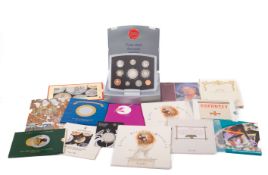 A Royal Mint 2000 executive proof set, with eleven other mixed royal mint sets,