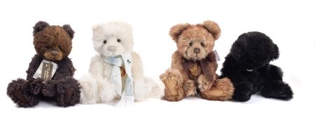 A collection of four Charlie Bear teddy bears.