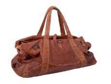 Two vintage brown leather holdall bags.