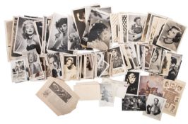 An accumulation of postcards and photographs of actors, many with facsimile or autopen signatures,